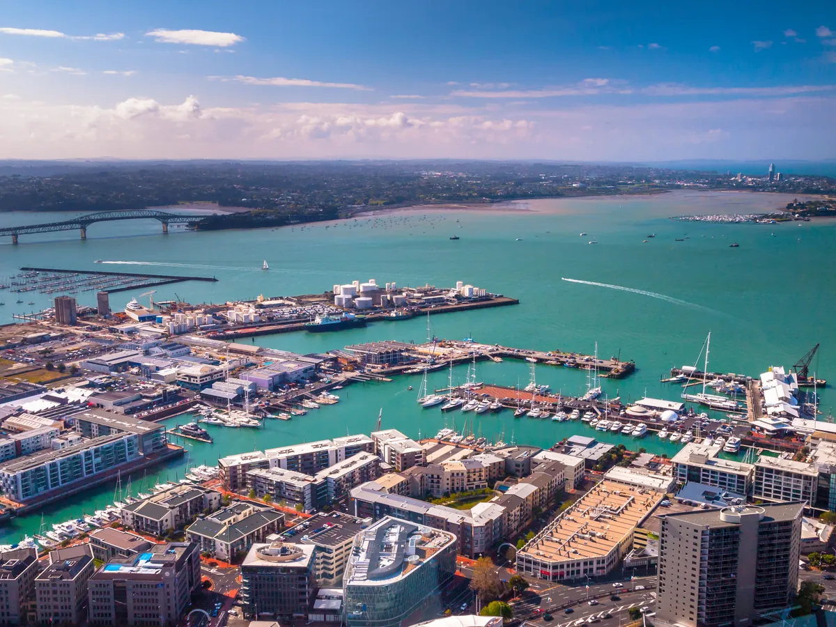 Aerial view of the Auckland waterfront and harbour marinas in bright daylight